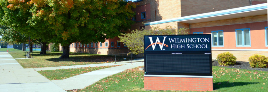 Wilmington High School entrance sign and sidewalk